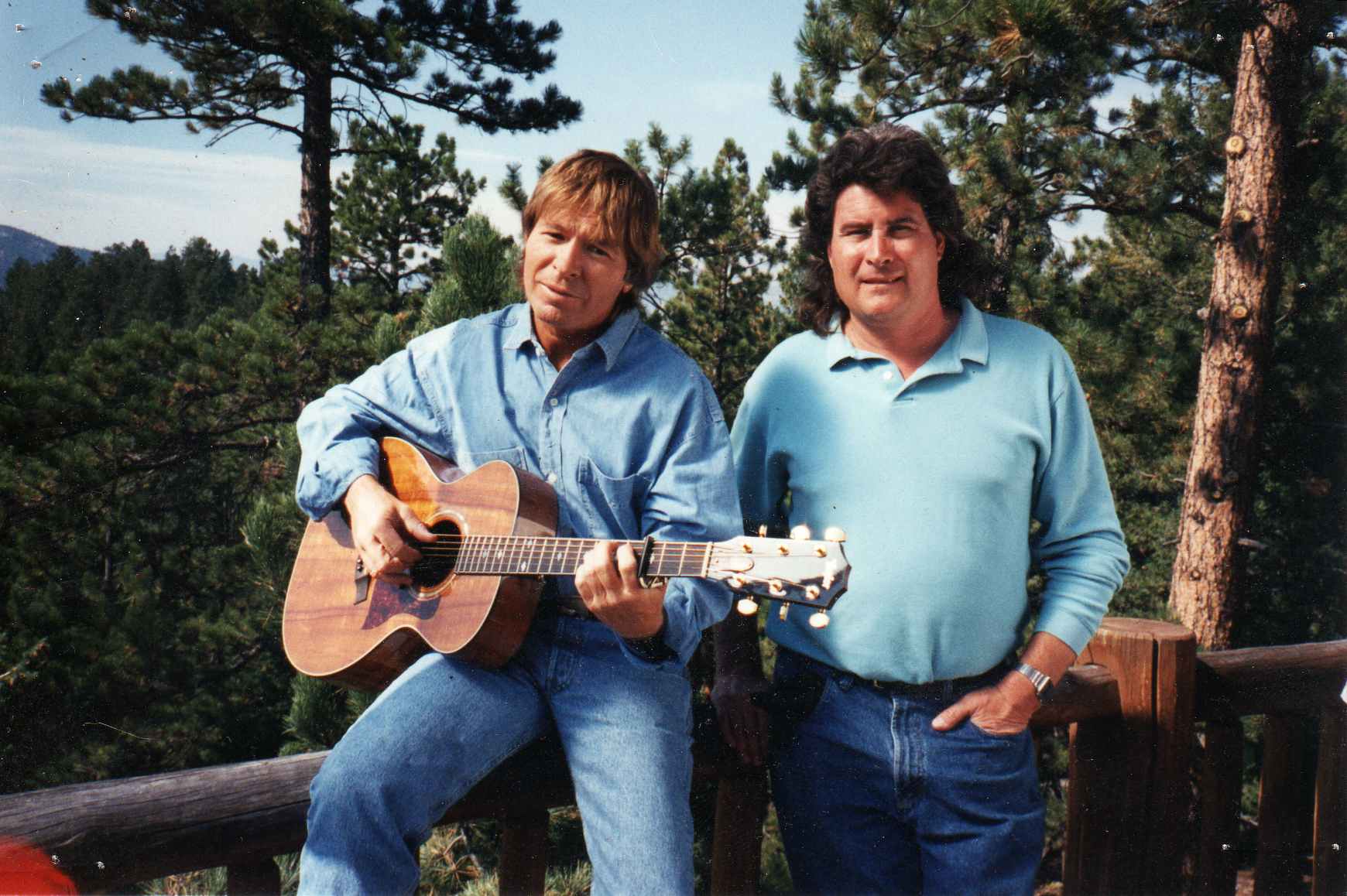 John Denver with Tommy on location during a production in 1990